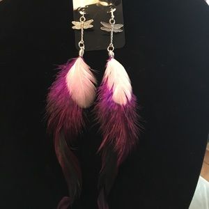Hand made feather earrings with charms.